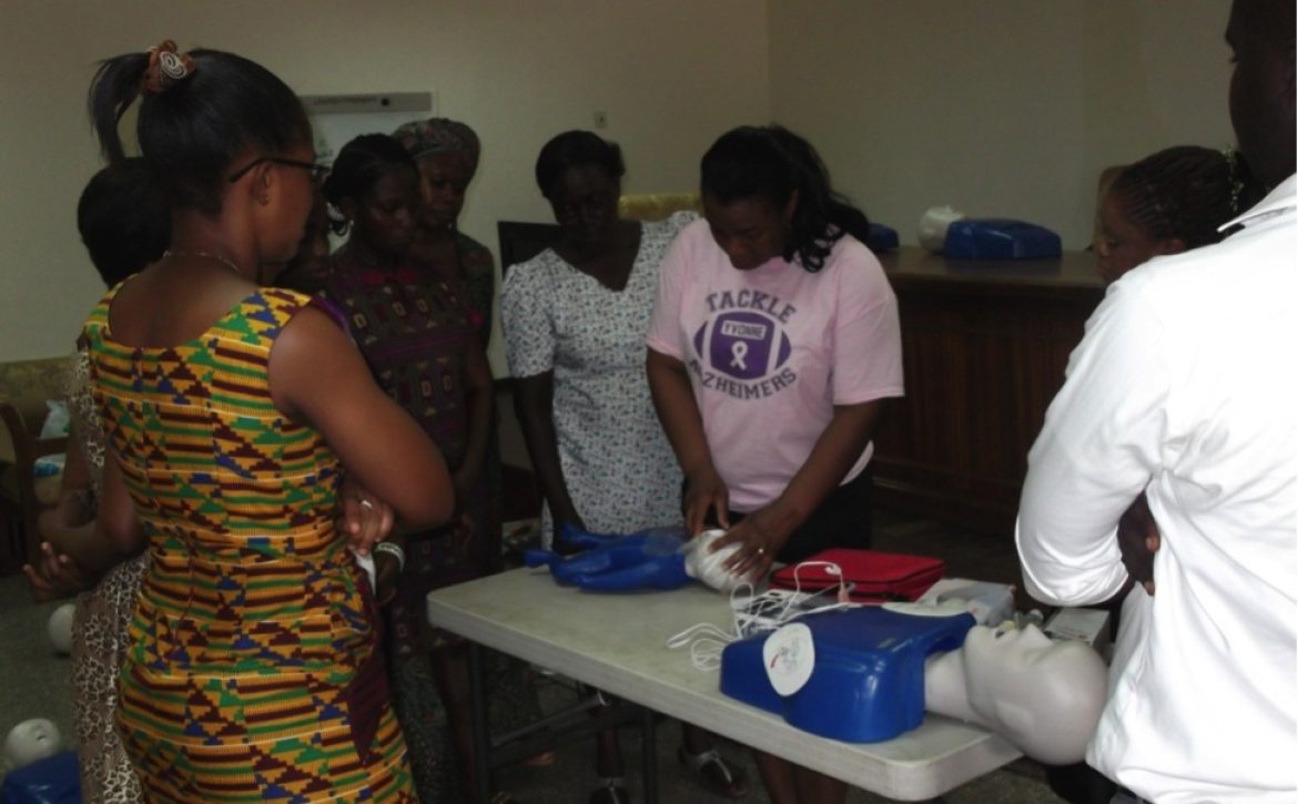 c. Mrs Yvonne Adih (Board President) giving practical Demonstration CPR-First Aid and Dementia